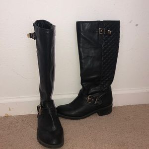 black boots, with gold zipper